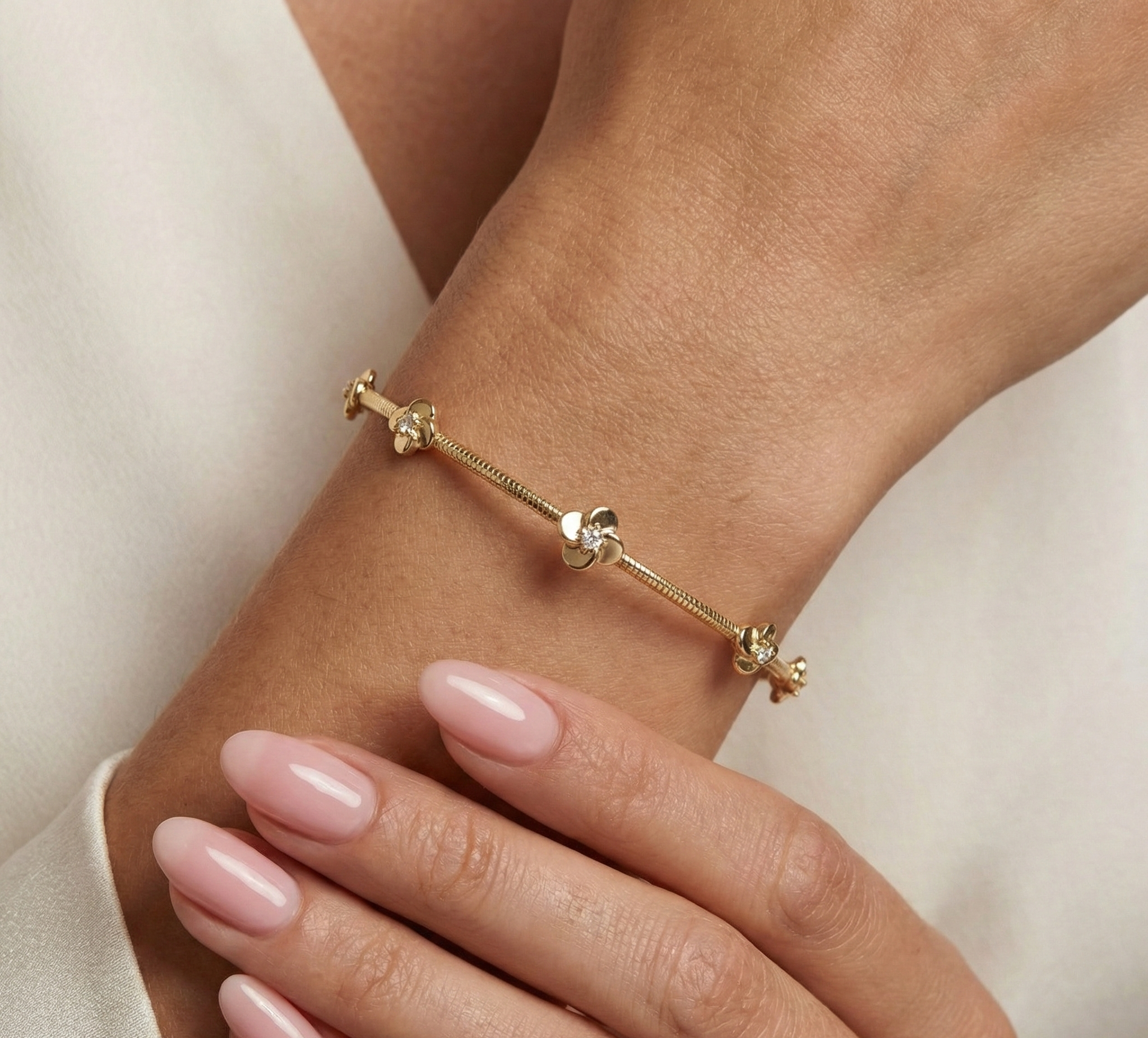 14K Gold Flexible Diamond Flower Station Bangle - 0.18 CT