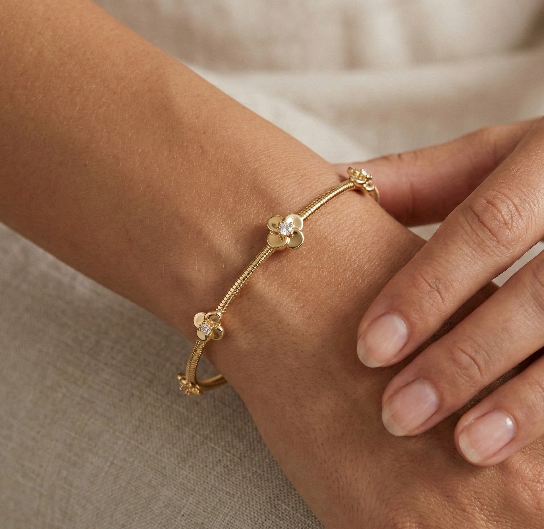 14K Gold Flexible Diamond Flower Station Bangle - 0.18 CT