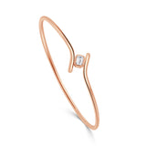 14K Gold Emerald Cut Diamond Flexible Bypass Bangle - 0.26 CT.
