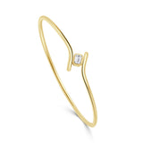 14K Gold Emerald Cut Diamond Flexible Bypass Bangle - 0.26 CT.